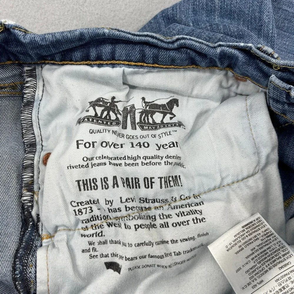 Levi's 511‎ Slim Fit Jeans Mens 34x30 Blue Medium Wash Distressed Denim